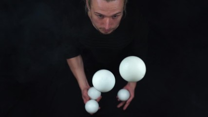 Wall Mural - Closeup of man juggling balls. Concept of success, business and managing