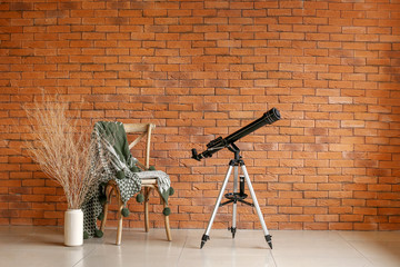 Interior of modern room with telescope