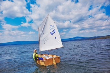 Wall Mural - Sailing training yachting sport kids in lake