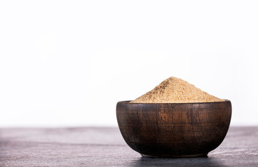 Poster - Organic maca root powder in wooden bowl - Lepidium meyenii