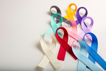 Multi Colored Cancer Ribbons Proudly Worn By Patients, Supporters And Survivors For World Cancer Day. Bringing Awareness To All Types Of Cancer