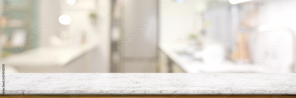 Cropped shot of empty marble table in blurred kitchen room - obrazy, fototapety, plakaty 