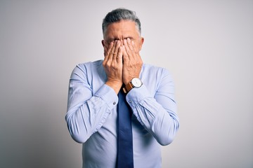 Sticker - Middle age handsome grey-haired business man wearing elegant shirt and tie rubbing eyes for fatigue and headache, sleepy and tired expression. Vision problem