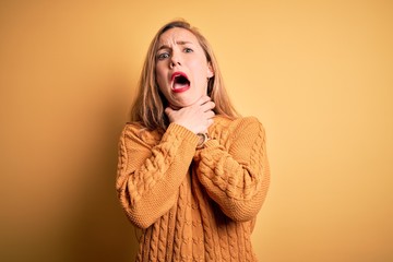 Sticker - Young beautiful blonde woman wearing casual sweater standing over yellow background shouting suffocate because painful strangle. Health problem. Asphyxiate and suicide concept.