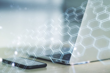 Poster - Creative concept of wireless technology with hexagon hologram on modern laptop background. Big data and database concept. Multiexposure