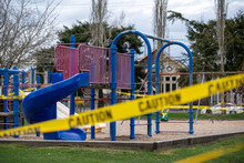 Police Caution Tape Closing A Children Playground Slider