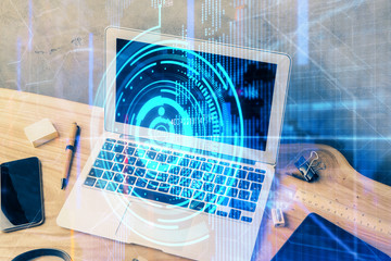 double exposure of desktop computer and technology theme hologram. concept of software development.