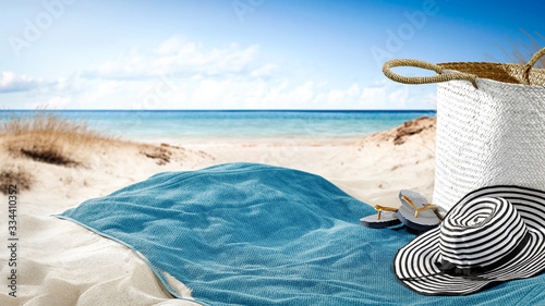 Fotomural towel on sand and beach background