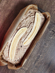 Healthy fresh baked banana bread on wooden board