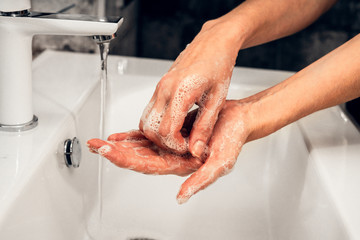  Coronavirus. Proper washing and handling of hands. Liquid antibacterial soap. Self-isolation and hygiene.