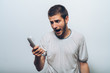 © aeroking - Close up image of a man screaming on the telephone during the conversation.