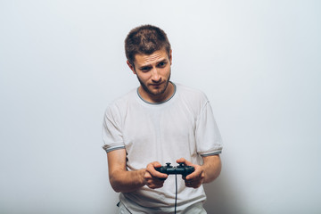 Man playing on the joystick in a game console