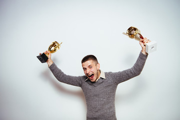 man with a golden cup