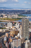 Fototapeta Nowy Jork - Bird eye view of skyscrapers in the Kita downtown with Yodo River on the background. Osaka. Japan