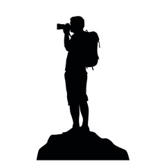 Wall Mural - adventurous photographer silhouette