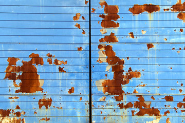 Wall Mural - ornate weathered rusting metal blue warehouse wall