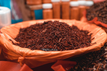 Red fried grasshoppers with chili peppers