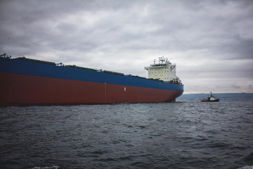Poster - launching of renovated tanker cargo ship from dock to water.