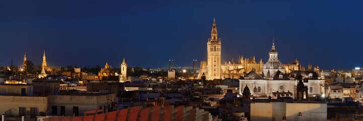 Wall Mural - Seville night rooftop panorama view