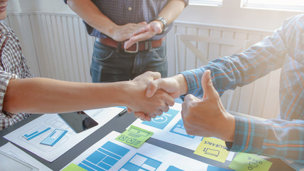 Soft Focus and Blur,A group of web designers are working together to develop a mobile responsive website with UI UX Front End Designer Previewing. Website development concept UI UX front end designer 