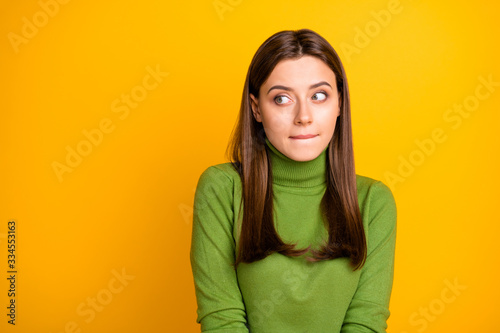Cuadros en Lienzo Portrait of scared frightened girl made mistake look copyspace bite lisp wear st
