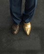 concept of rich and poor in a shoes, old and golden shoe