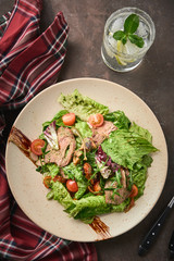 Wall Mural - Warm salad with beef, cherry tomatoes and sun-dried tomatoes. Healthy food