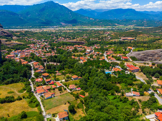 Greece. The historical region of Thessaly. Rocks of Meteora. View of the Thessalian Plain. Popular tourist spot. Drone. Aerial view. The camera moves forward