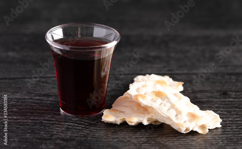 Elements of the Holy Communion or Lords Supper on a Wooden Table