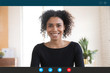 © fizkes - Headshot portrait screen application view of smiling african american millennial woman talk on video call, happy biracial young female employee involved in web conference, discuss ideas online