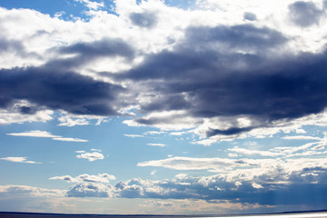 Wall Mural - Clouds over the river.