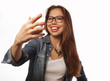 © Raisa Kanareva - Pretty hipster girl taking selfie. Young and happy.