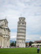 © Lazy Guruji - A shot of Leaning tower of Pisa with tourists