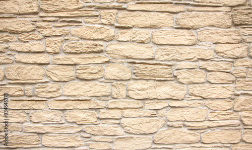 Fotomural Texture of stone wall, square yellow travertine tile.