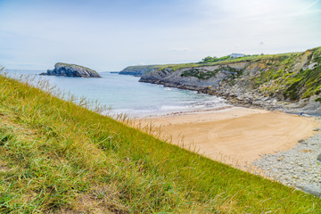 Wall Mural - Amazing coast with incredible cliffs near the village of Liencres. Cantabria. Northern coast of Spain