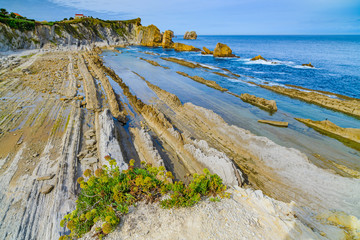 Wall Mural - Amazing coast with incredible cliffs near the village of Liencres. Cantabria. Northern coast of Spain