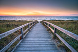 Fototapeta Na sufit - Wooden walkway along the beach, North Sea coast, Germany