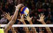 Volleyball spike blocking in front of  the net