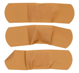 used sticking plasters isolated on white background. medical plasters.