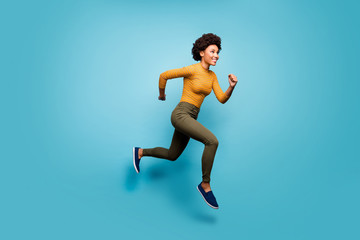 Wall Mural - Full length body size view of nice lovely healthy cheerful active purposeful wavy-haired girl running season marathon isolated on bright vivid shine vibrant blue green teal turquoise color background