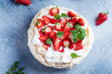 Cake Pavlova with meringue, strawberry and cream