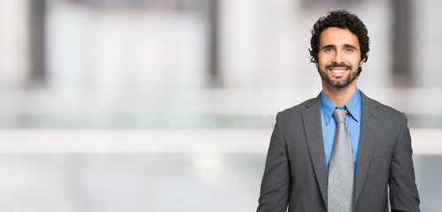 Smiling man, large bright background