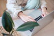 © lamapacas - work from home. Distance education, learning. Woman's hands typing on laptop at home close up. Selective focus.