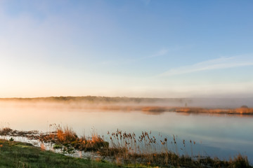 Wall Mural - beautiful sunny landscape with river, sun shines