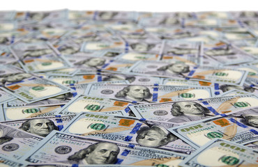 Many dollar banknotes on white