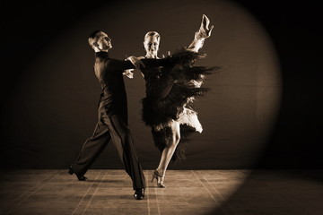 Wall Mural - dancers in ballroom isolated on black background