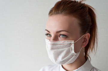 Portrait of a girl in a medical mask. Close up..