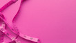 © Анна О - Pink centimeter on pink background. Simple flat lay with pastel texture. Fitness concept. Stock photo.