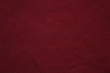 Dark burgundy red fabric texture background, empty abstract close up brown tone wallpaper. Empty dark fabric pattern, natural cotton blend design with blank copy space top view