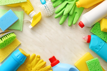 Set of cleaning supplies on light background